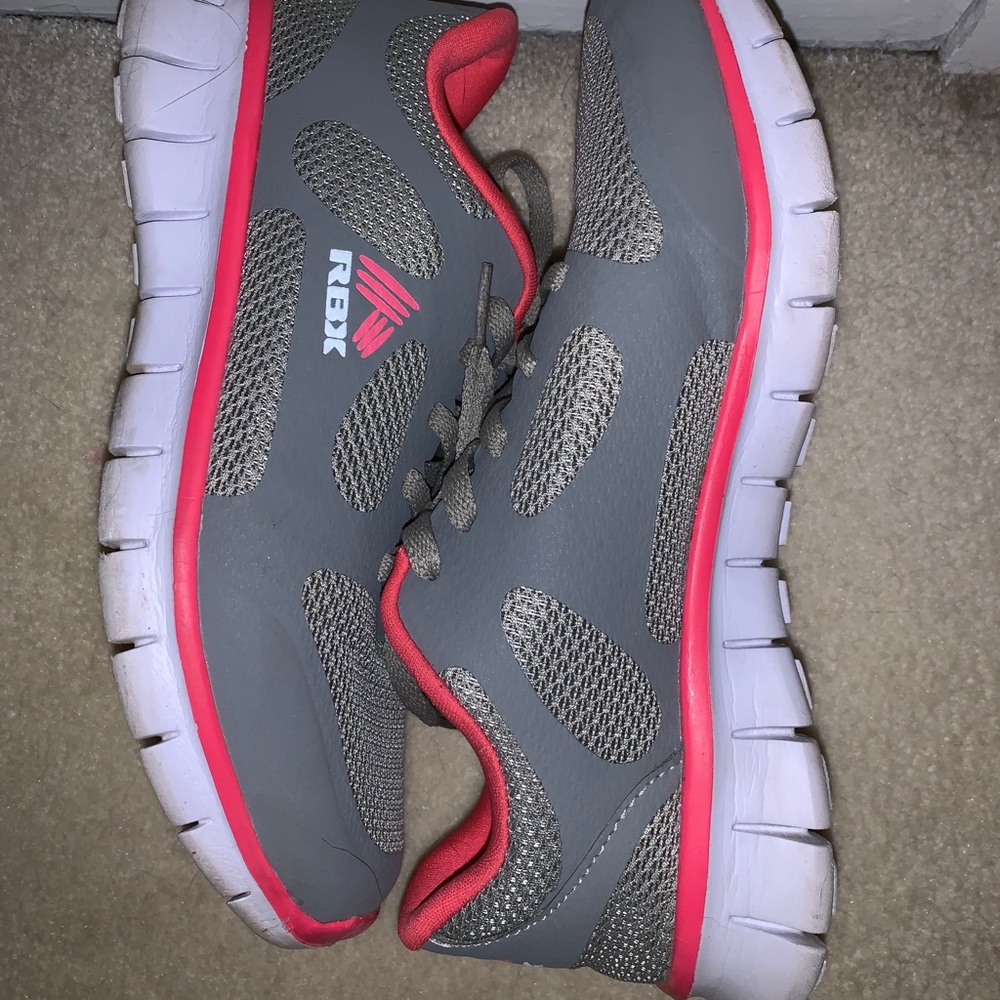 Grey and pink tennis shoes